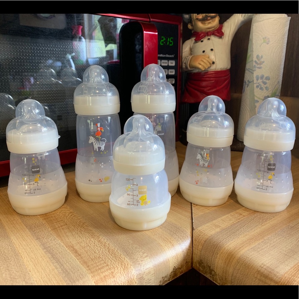 6 MAM bottles. Opened but never used.